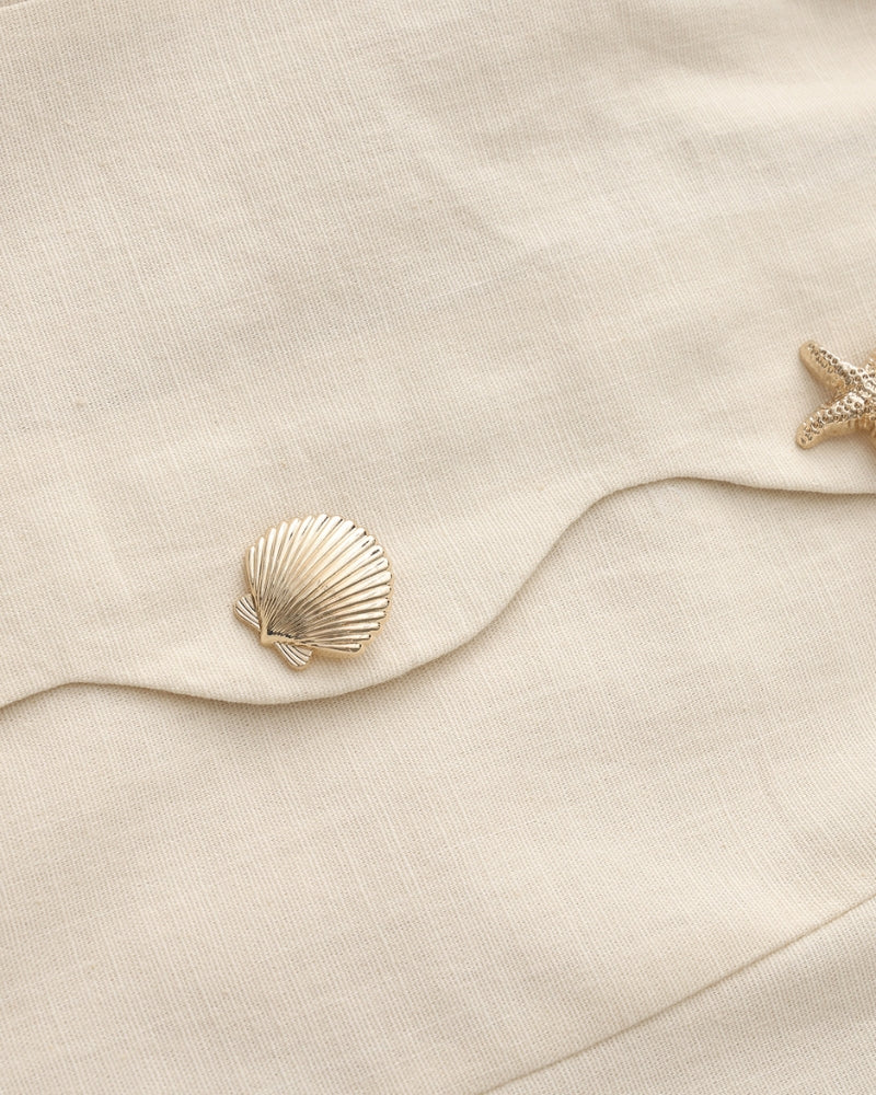 Elegante jurk met sculpturale details